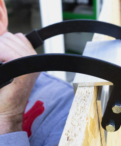 Alan Dawson, founder of Sheds Direct Ireland using the panel carrier with a sheet of plywood
