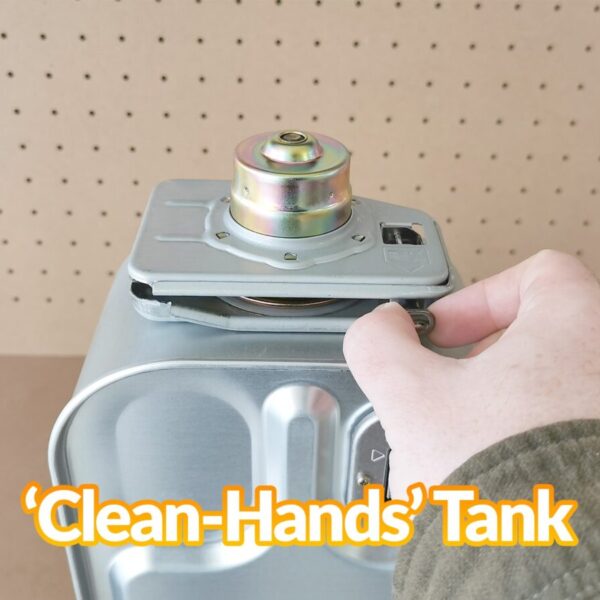 The clean-hands tank of the minimax heater in use. A hand is pulling the pin to open it.