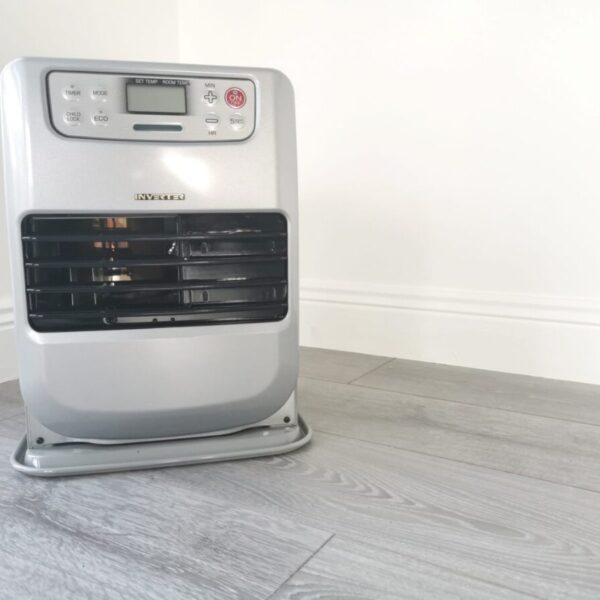 Minimax heater in a home against a white wall