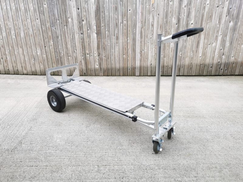 The metal backplate for the hand truck in action