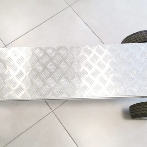Silver backing plate for a handtruck
