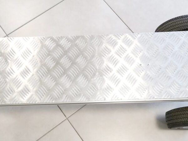 Silver backing plate for a handtruck