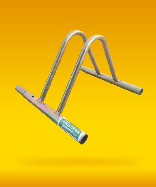 A bike rack against a yellow background