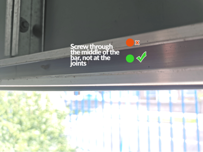 The correct position for screwing through the aluminium frame over the door in the Classic Range of Sheds from Sheds Direct Ireland