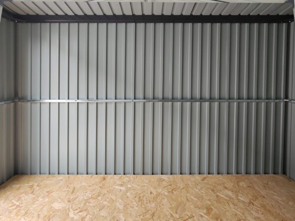 A view of the side wall on the inside of the 8ft x 10ft premium shed. The light is coming in from the left hand side and the walls are illuminated in a gradient