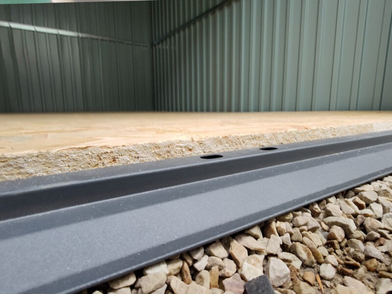 The lipped entry to the premium sheds. It's an anthracite grey which is smooth looking.