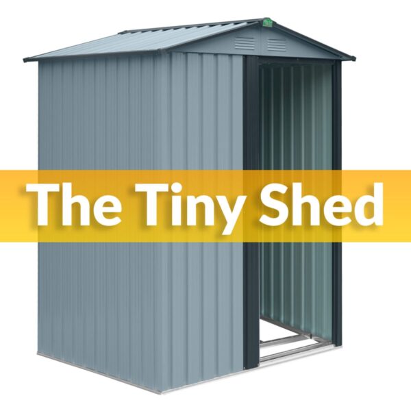 The Tiny Shed in grey against a white backdrop. It is a pale shade of grey with a darker grey trim. There is a one sliding door which is open. It reads 'THE TINY SHED' on top.