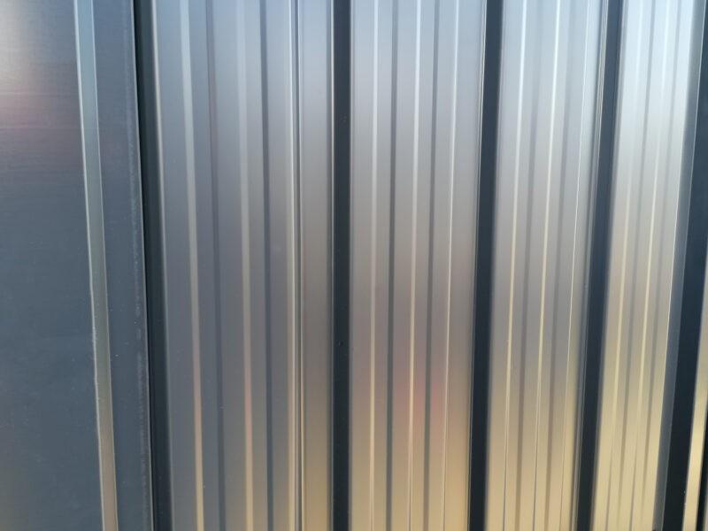 A macro shot of the sheet metal on the premium panoramic shed