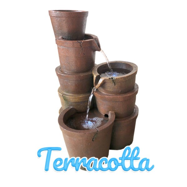 Three stacks of Terracotta pots stand together. THe first stack is 5 pots high, the second is 3 and the last is a single pot. Water flows downwards through them.