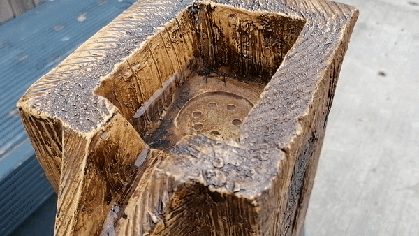 A moving gif of the water flowing down the various spouts on the Timber Flow Water Feature