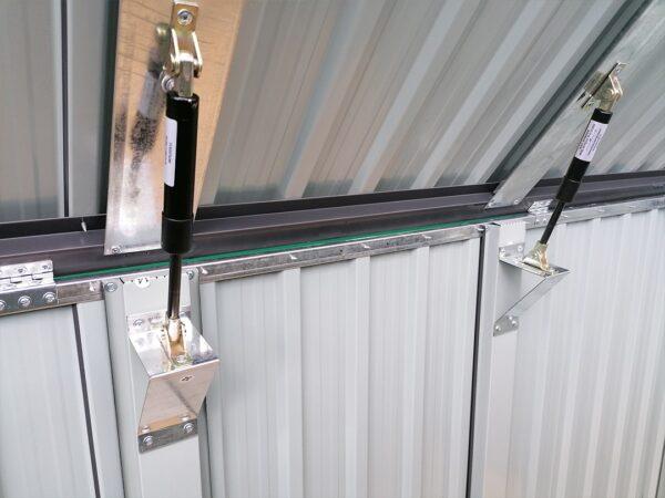 The black and silver gas hinges on the 3-bin store