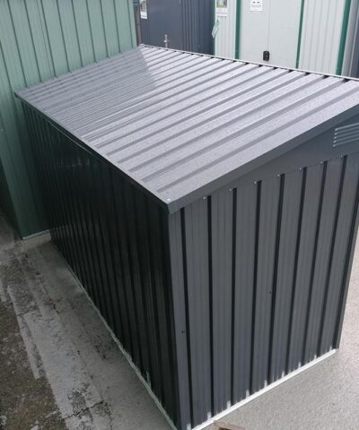 The bin store as seen from behind. The lid is reflecting the sun above so it is brighter in appearance than the rest of the unit