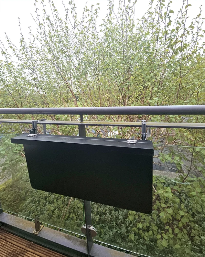The black balcony shelf on a glass balcony