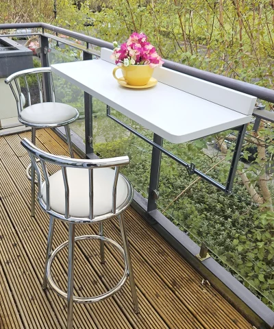 The large white balcony table