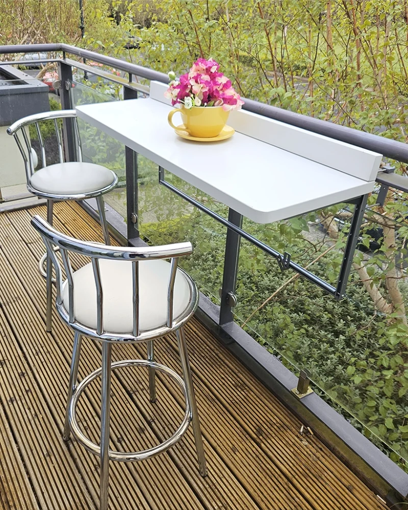 The large white balcony table