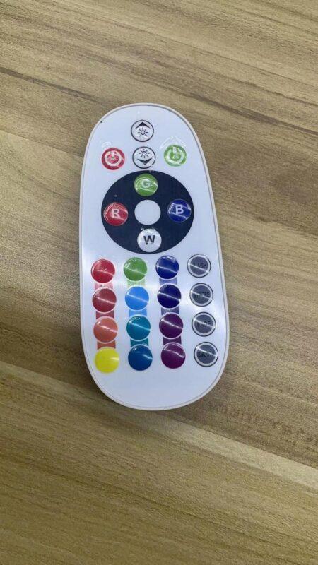 The remote control for the led swing chair. It is a flat unit with a shiny white casing. There are 4 buttons at the top which dictate the speed. Below these are 4 more buttons which control the colour and brightness manually and below these are 16 pre-set colours like red, cyan, lime, pink and purple. 