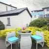 The bistro set in a garden