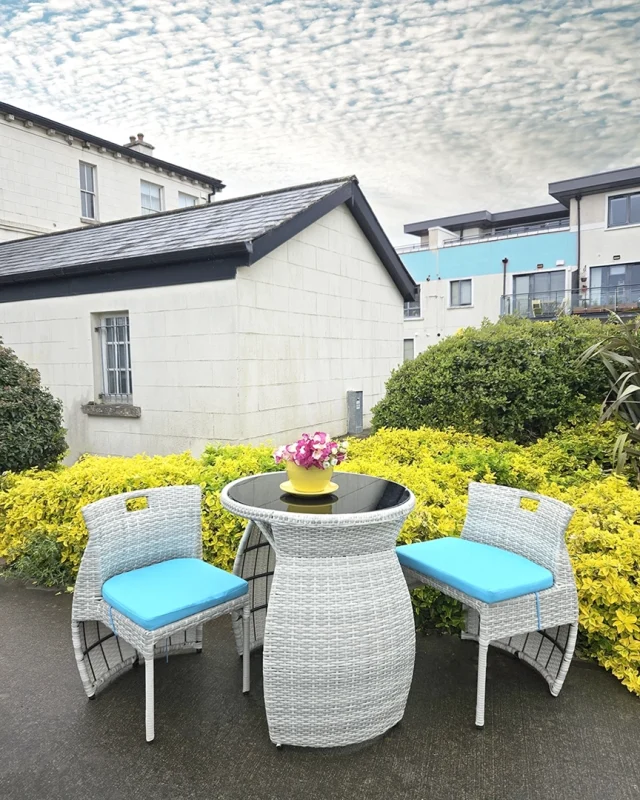 The bistro set in a garden