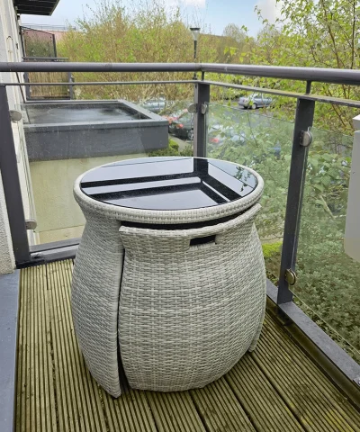 The bistro set compacted on a balcony