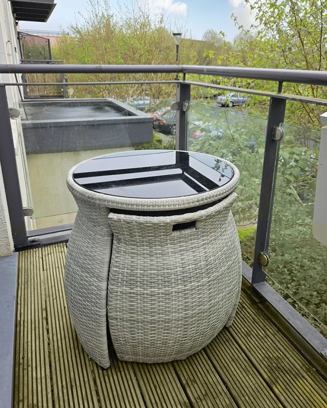 The bistro set compacted on a balcony