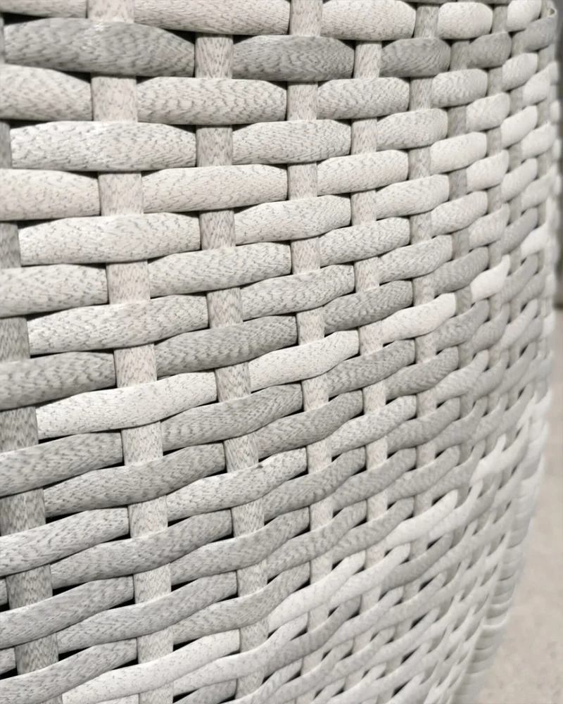 The rattan exterior of the bistro set