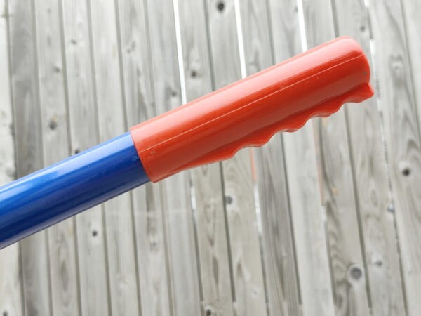 Handle detail on the blue hand trolley from sheds direct Ireland showing the red handle with finger grooves