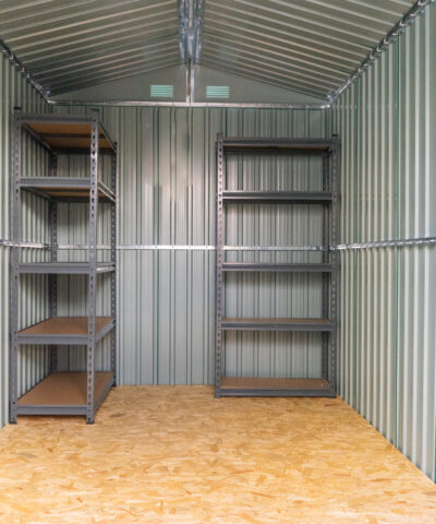 Shelves inside a steel shed. There are 5 tiers and the tiers have wooden bases.