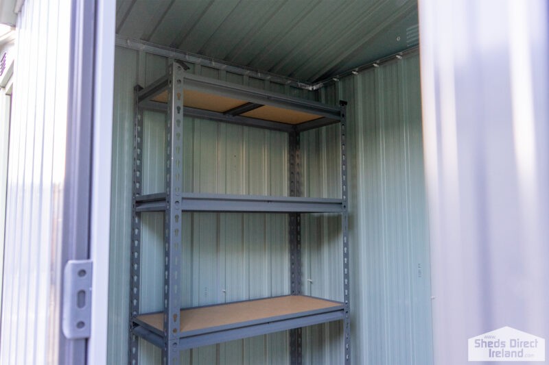 Shelves inside a steel shed. There are 5 tiers and the tiers have wooden bases.