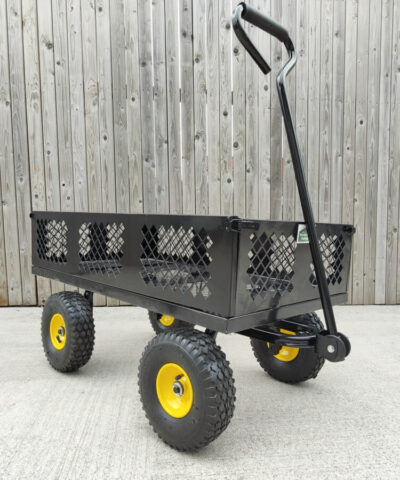 The black mesh cart from Sheds Direct Ireland against a wooden wall