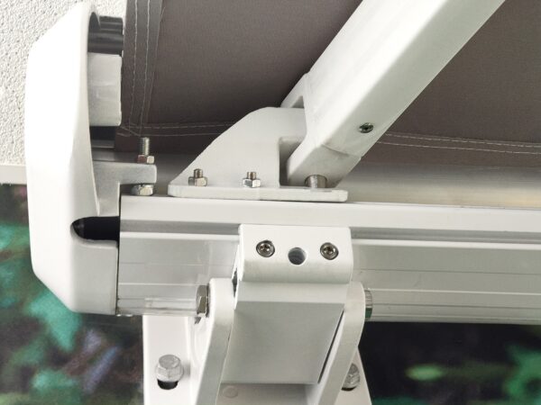 The white and grey support bar of the awning cover from Sheds Direct Ireland