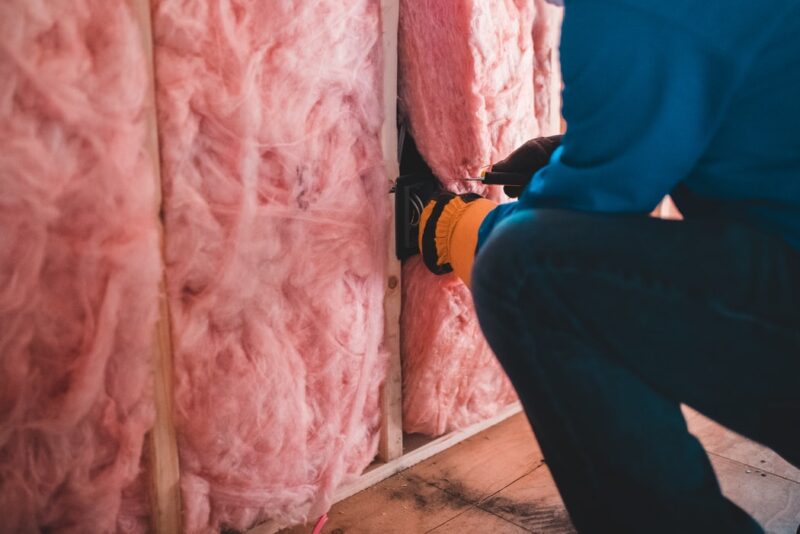 Showing the insulating process in action. This will help avoid condensation in steel sheds. The photo belongs to Erik Mclean