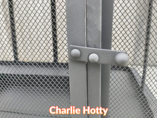 A macro detail of the locking mechanism of the Charlie Hotty Fire pit