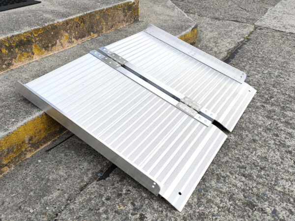 The Wheelchair Ramp against a step