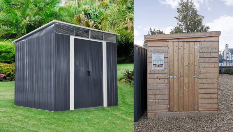 A grey steel pent shed on a grassy hill with a sloped pent roof visible, next to a wooden 'cabin-style' shed which also has a pent roof. The wooden sheds' pent roof slopes from side to side rather than from front to back, however