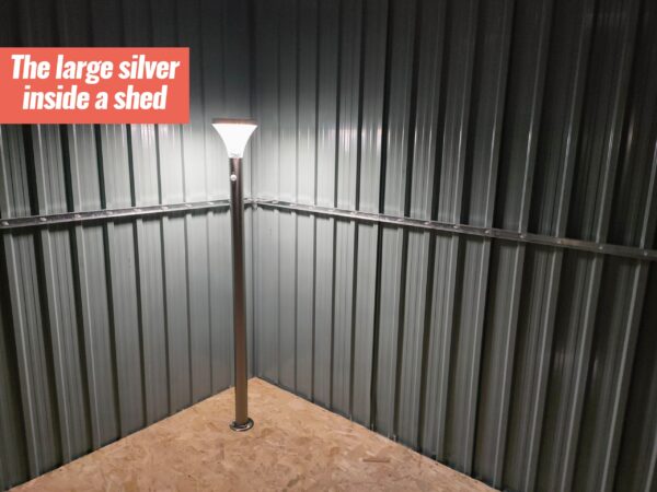 The large silver LED Garden light illuminating the inside of a silver garden shed