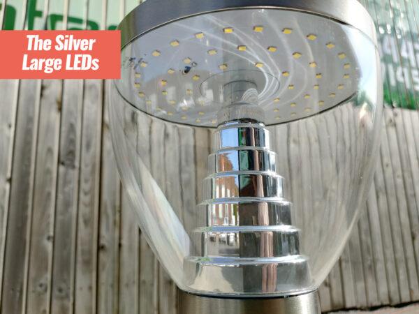 The Large Garden Light as seen from the underside. This shows the twirled internal silver piece and the dozens and dozens of small, yellow LED panels