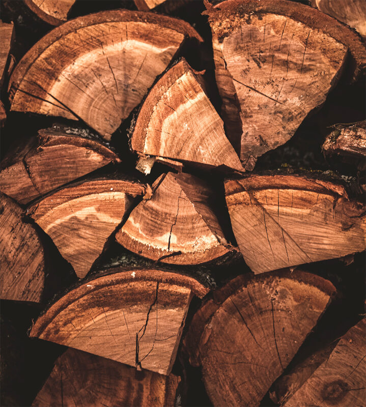 Image of a number of blocks of dry wood. This is the best wood in terms of fire pit safety