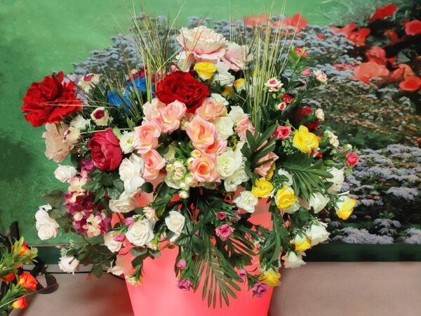 The Almore Flower Pot filled with Flowers