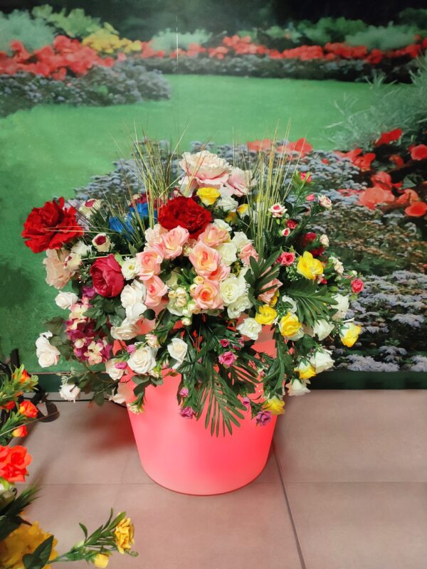 The Almore Flower Pot filled with Flowers