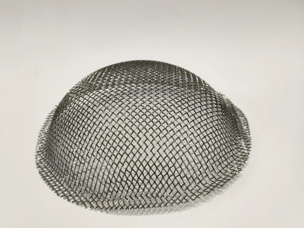 A Mesh dome for a camping stove on a white backdrop