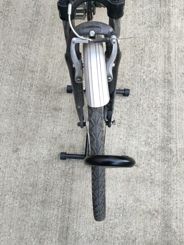 An overhead view of the Bike Stand, showing the wheel gently positioned in the port
