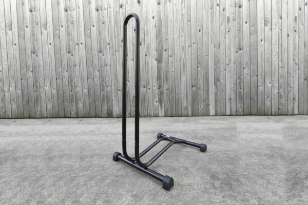 A 45 degree view of the large, bike stand from Sheds Direct Ireland. It is black and in this image you can more clearly see the rubber stopper feet.
