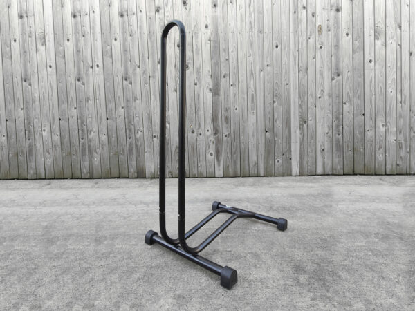 A 45 degree view of the large, bike stand from Sheds Direct Ireland. It is black and in this image you can more clearly see the rubber stopper feet.