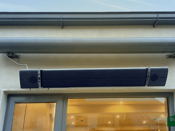 The Ronan Heating heater mounted outside a house above a window