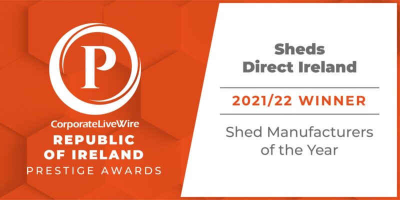 The Prestige Awards orange and white banner which reads 'Sheds direct ireland - 2021/2022 winner shed manufacturer of the year'