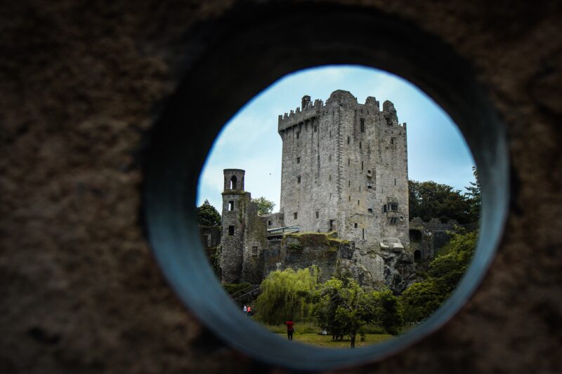 A photo by Connor Misset of Blarney Castle from a peep hole. 