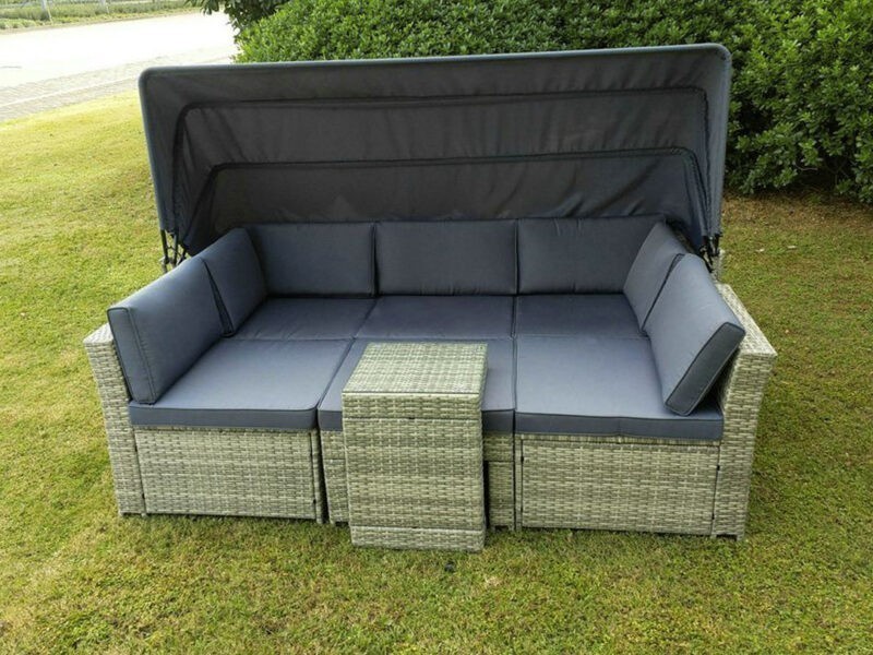 The rattan garden sofa set all combined into one long unit that could facilitate two people lying down