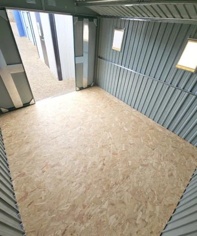 an internal view from the back of the shed looking outwards