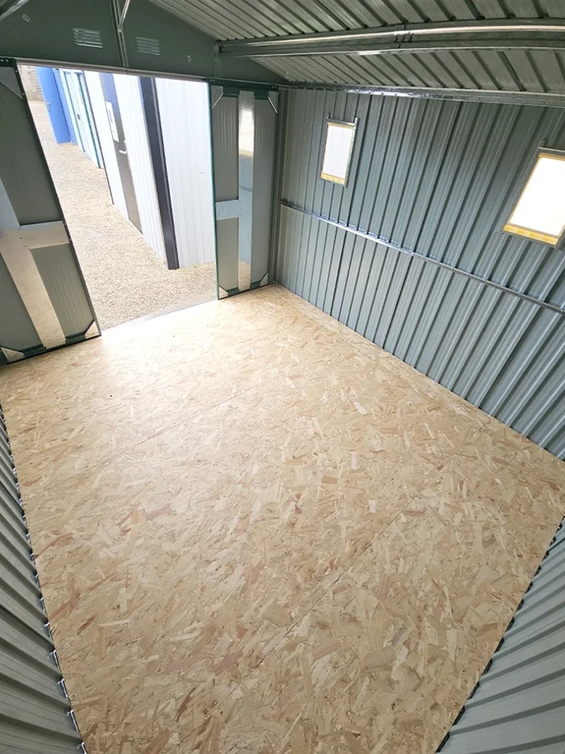 an internal view from the back of the shed looking outwards