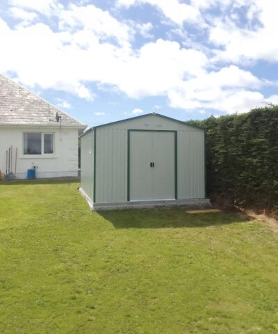 The Off-White Colossus shed in a garden in Co. Kerry